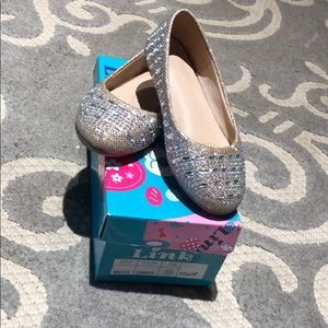 Girls sparkly champagne flats.